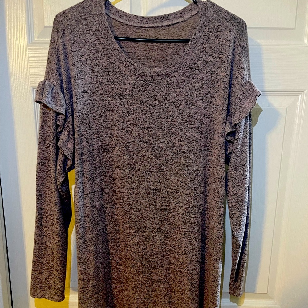 Light pinkish and black sweater